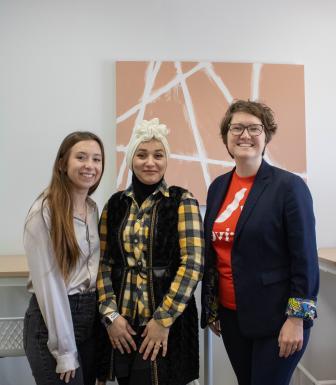 Hiam Al Naqqash stands with two other women